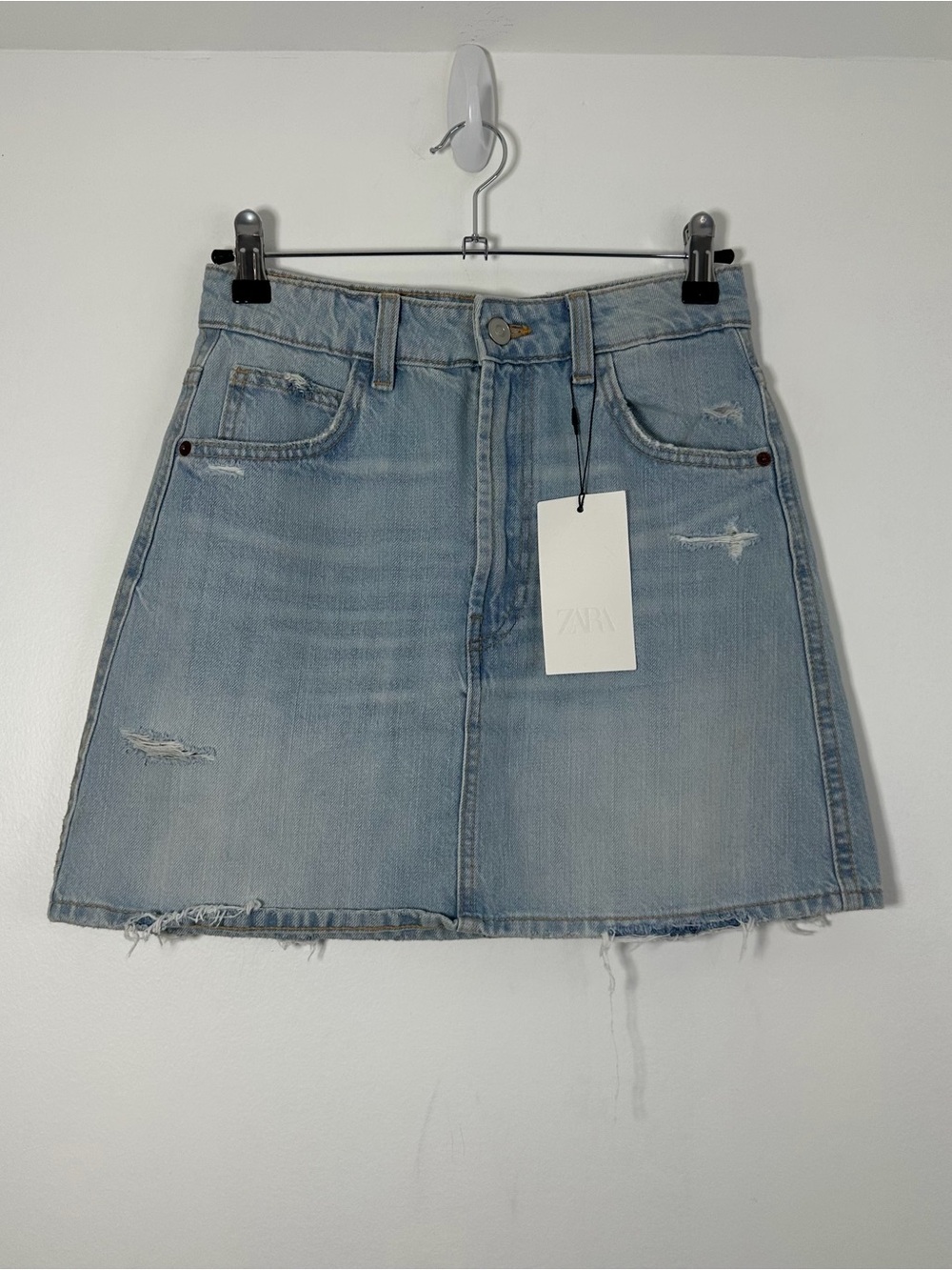 Zara Distressed Light Wash Denim Mini Skirt Size XS 24 NWT Raw Hem
